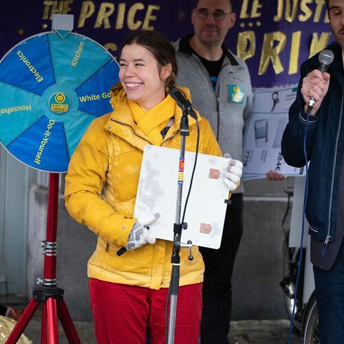 A Repair Day 2023 event: a woman standing behind a microphone